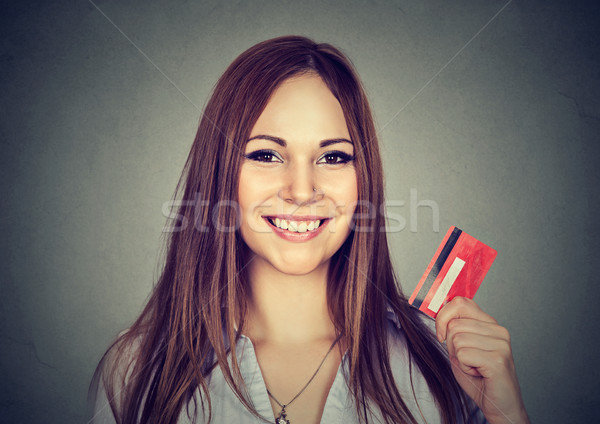 Happy woman shopping holding showing credit card Stock photo © ichiosea