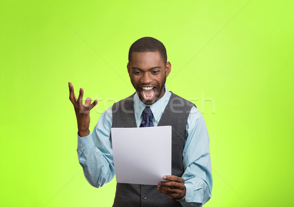 Stock photo: Excited happy man holding document, receiving goood news