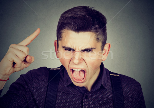 portrait of an angry young man Stock photo © ichiosea