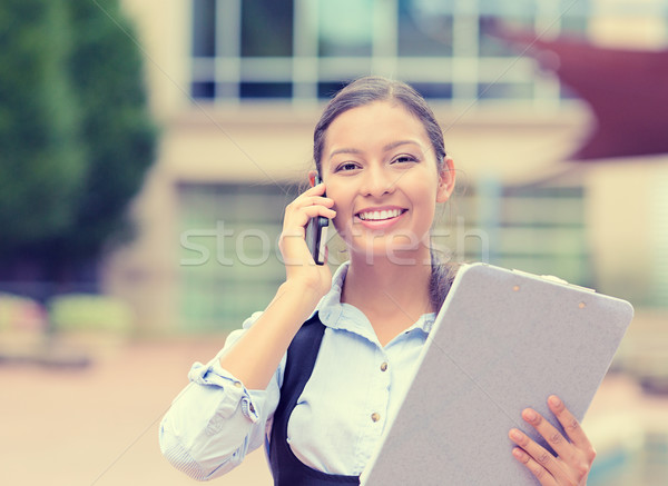 Imprenditrice imprenditore prendere appunti parlando telefono cellulare di successo Foto d'archivio © ichiosea