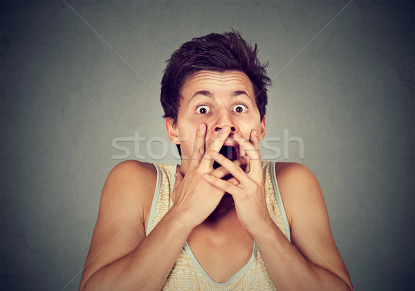 young man looking shocked scared  Stock photo © ichiosea