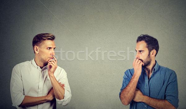 profile of two preoccupied businessmen looking at each other Stock photo © ichiosea