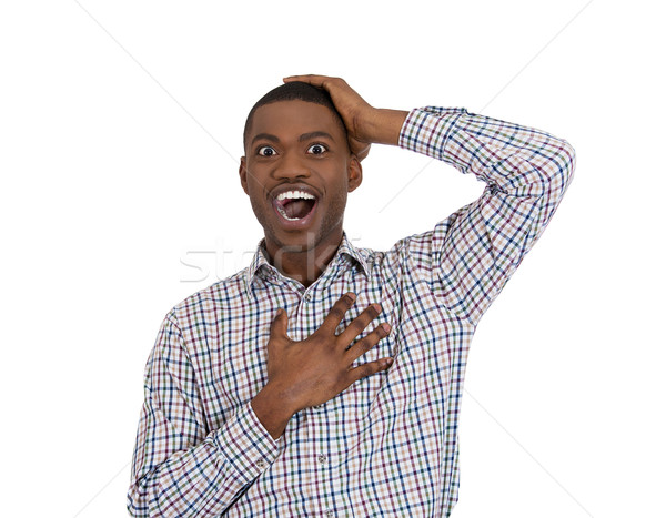 guy shocked and surprised with hand on chest Stock photo © ichiosea