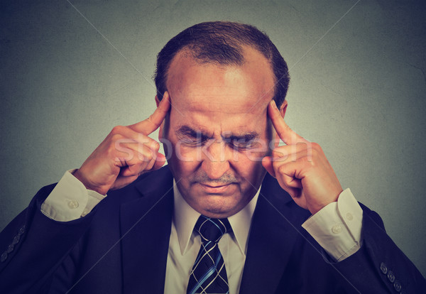 sad man with worried stressed face expression thinking trying to concentrate Stock photo © ichiosea