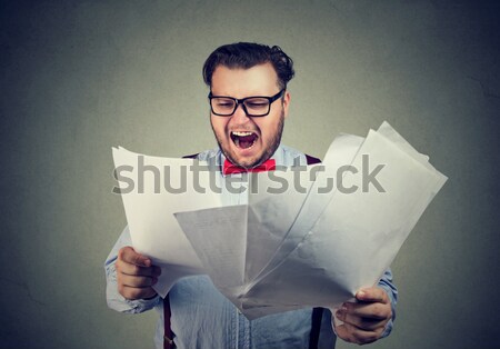 Angry business man screaming at computer Stock photo © ichiosea