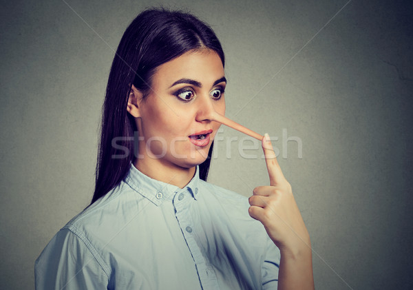 Leugenaar vrouw lang neus geïsoleerd grijs Stockfoto © ichiosea