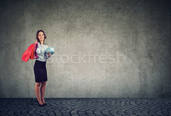 Woman spending money on shopping Stock photo © ichiosea