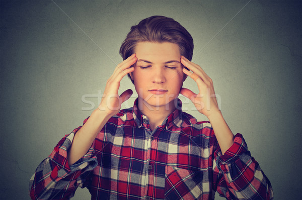 man thinking intensely concentrating  Stock photo © ichiosea