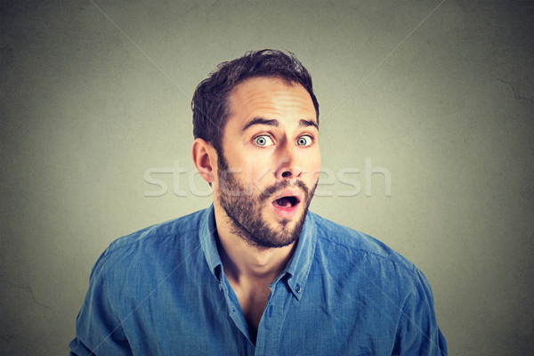 Stock photo: Portrait of a shocked young man in full disbelief  