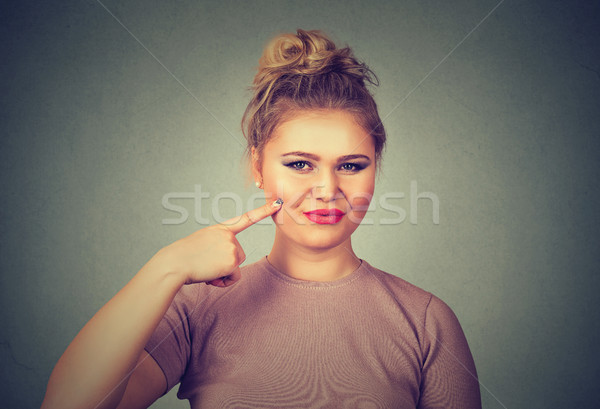 happy young woman with It tastes good gesture Stock photo © ichiosea