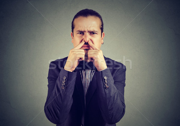 Man suffering from bad smell Stock photo © ichiosea