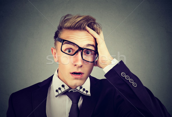 Desperate shocked defeated man looking at camera  Stock photo © ichiosea
