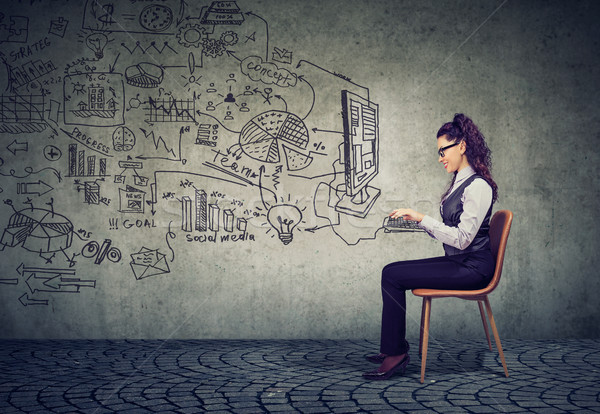 businesswoman working in an office brainstorming business plan  Stock photo © ichiosea