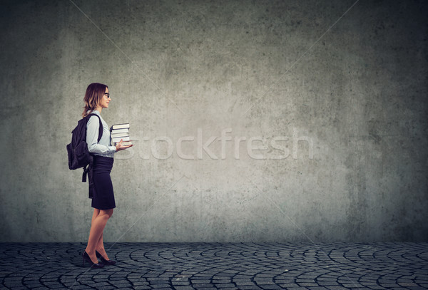 Woman with backpack and textbooks Stock photo © ichiosea