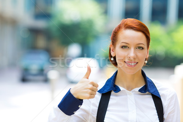 Stock photo: Business woman giving thumbs up