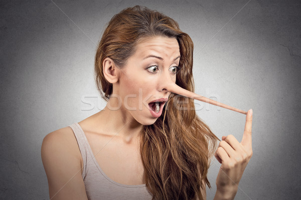 Kobieta długo nosa odizolowany szary ściany Zdjęcia stock © ichiosea