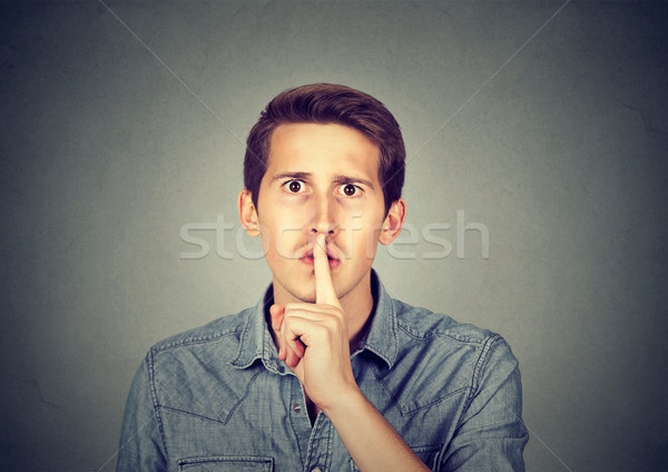 Homem calma silêncio segredo gesto jovem Foto stock © ichiosea