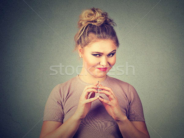 Sneaky, sly, scheming young woman plotting something. Negative human emotions, facial expressions Stock photo © ichiosea