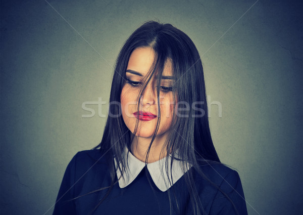 Jonge triest vrouw naar beneden te kijken haren Rood Stockfoto © ichiosea