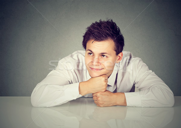 Shot of a handsome man looking thoughtful and happy  Stock photo © ichiosea