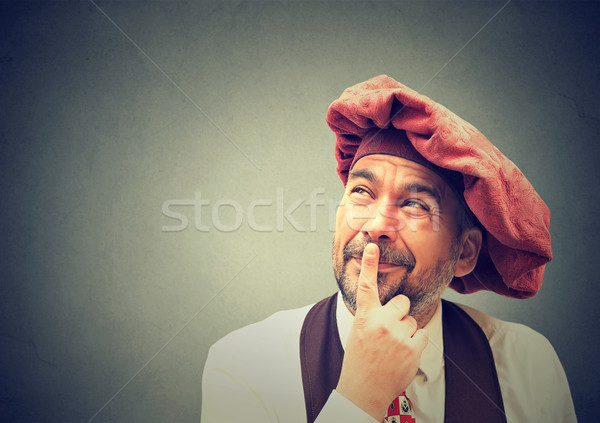 Portrait of a thoughtful mature man looking up wondering  Stock photo © ichiosea