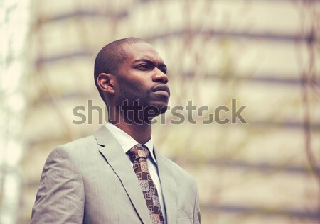 business man in a stylish suit standing outside corporate office  Stock photo © ichiosea