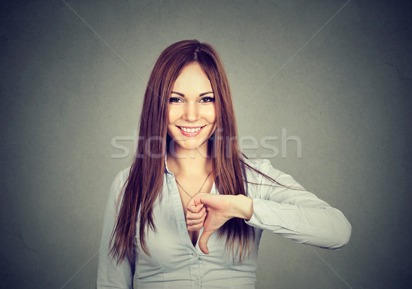Kobieta w dół gest szczęśliwy Zdjęcia stock © ichiosea