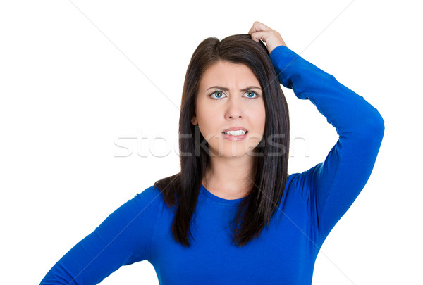 Stock photo: Woman scratching head