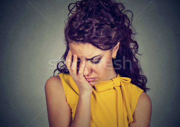 depressed sad woman leaning head on hand  Stock photo © ichiosea