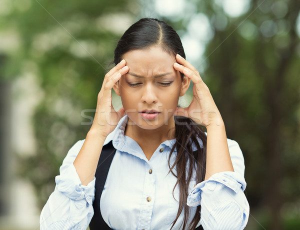Stressed woman having headache Stock photo © ichiosea