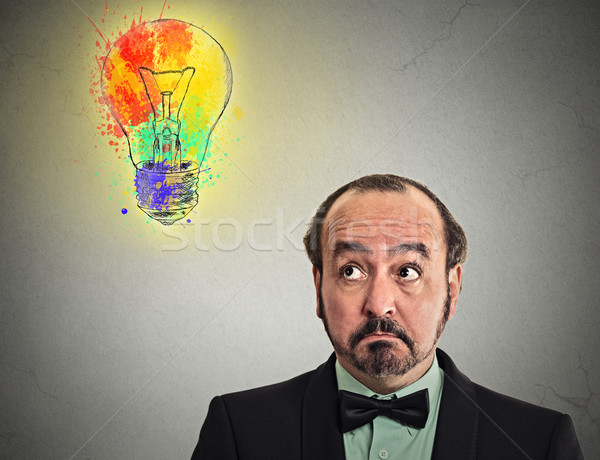 confused man looking up searching brilliant idea Stock photo © ichiosea