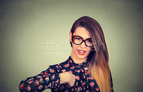 Upset woman pointing finger asking you talking to me you mean me?  Stock photo © ichiosea