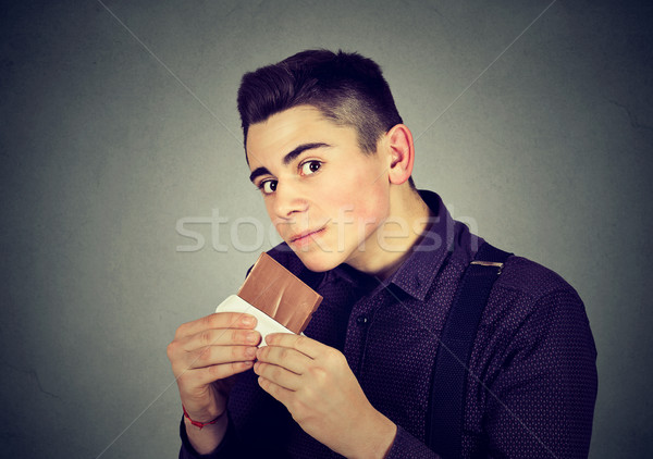 Férfi fáradt diéta sóvárgás édesség csokoládé Stock fotó © ichiosea