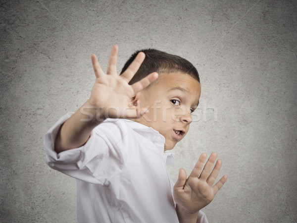 child boy looking scared trying to protect himself Stock photo © ichiosea