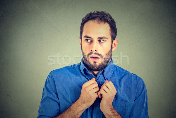 nervous stressed young man student feels awkward looking away  Stock photo © ichiosea