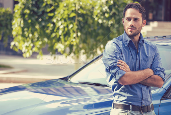 Handsome man standing in front of his car Stock photo © ichiosea