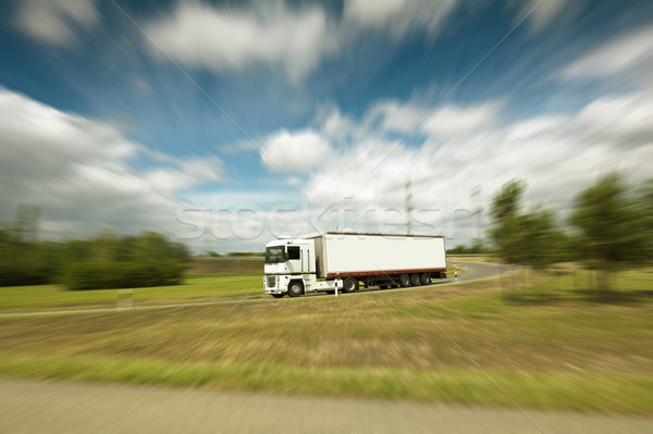 Camión blanco asfalto cielo azul nubes Foto stock © ifeelstock