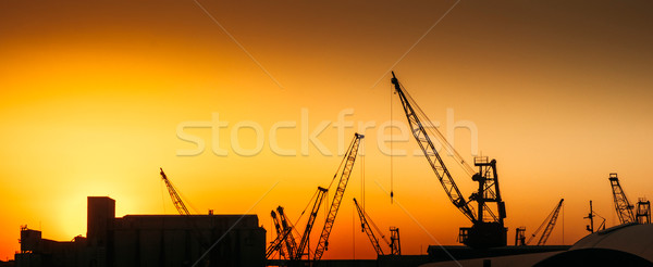 Construção indústria produção quente pôr do sol Foto stock © ifeelstock