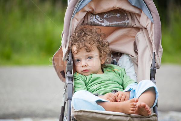 Baby boy outdoor in stroller Stock photo © igabriela