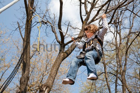 Little girl in a bungee Stock photo © igabriela