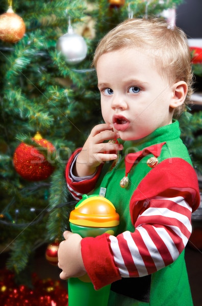 Baby by the Christmas tree Stock photo © igabriela