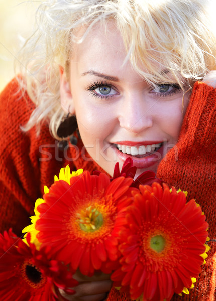 秋 若い女性 肖像 赤い花 屋外 ストックフォト © igabriela