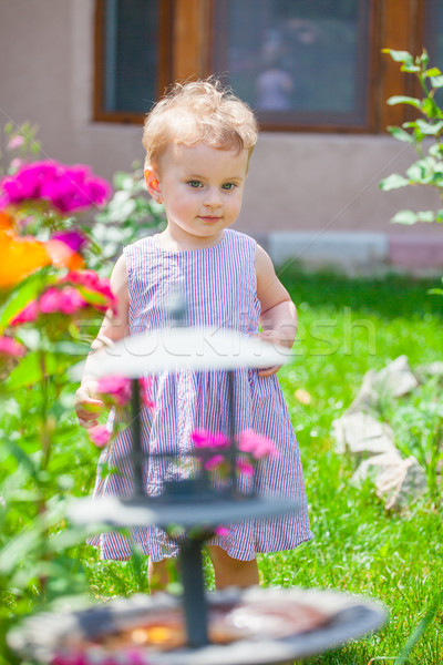 1 éves kislány kert portré virágoskert otthon Stock fotó © igabriela
