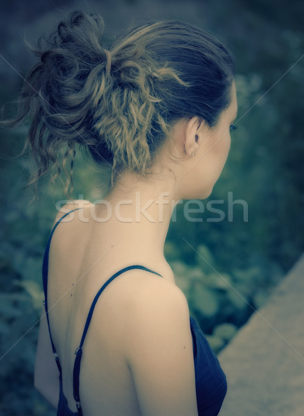 Young woman's back in romantic light outdoor Stock photo © igabriela