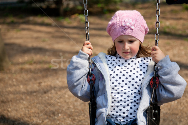 Petite fille Swing printemps jour parc [[stock_photo]] © igabriela