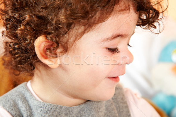 Kislány portré kétéves göndör haj baba mosoly Stock fotó © igabriela