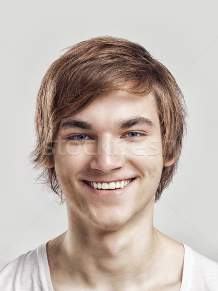счастливое лицо портрет красивый молодым человеком серый улыбка Сток-фото © iko