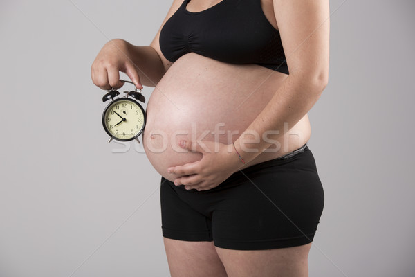 時間 天生的 孕婦 顯示 肚 時鐘 商業照片 © iko