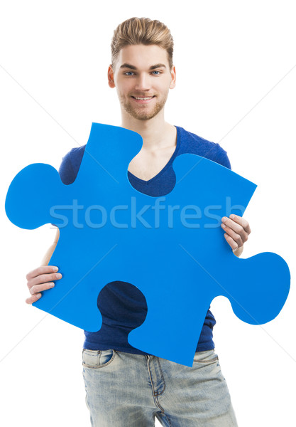 Jonge man puzzel stuk goed kijken Blauw Stockfoto © iko