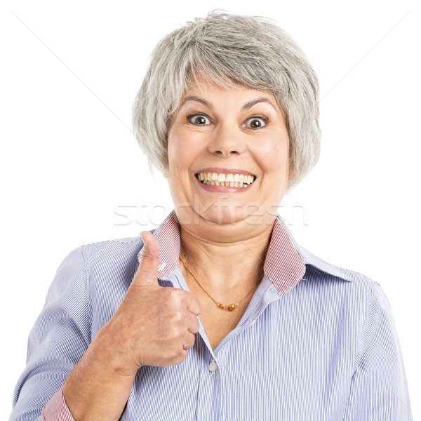 Elderly woman with thumbs up Stock photo © iko